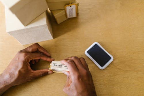 Free Person Holding a Thank You Card Stock Photo