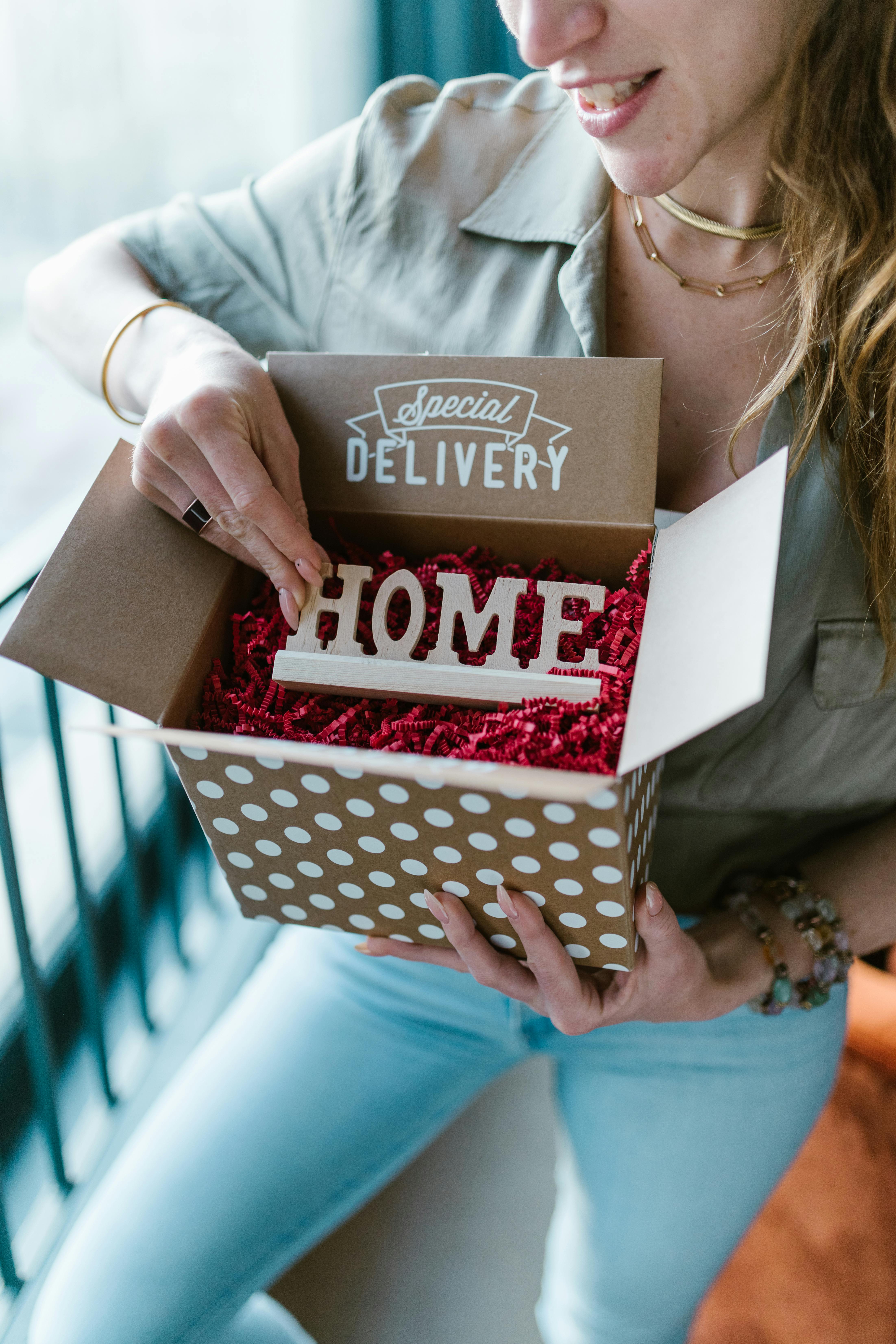 woman holding happy birthday cake