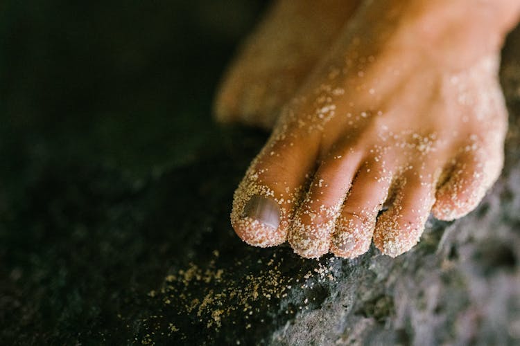 Close-Up Shot Of A Sandy Toes