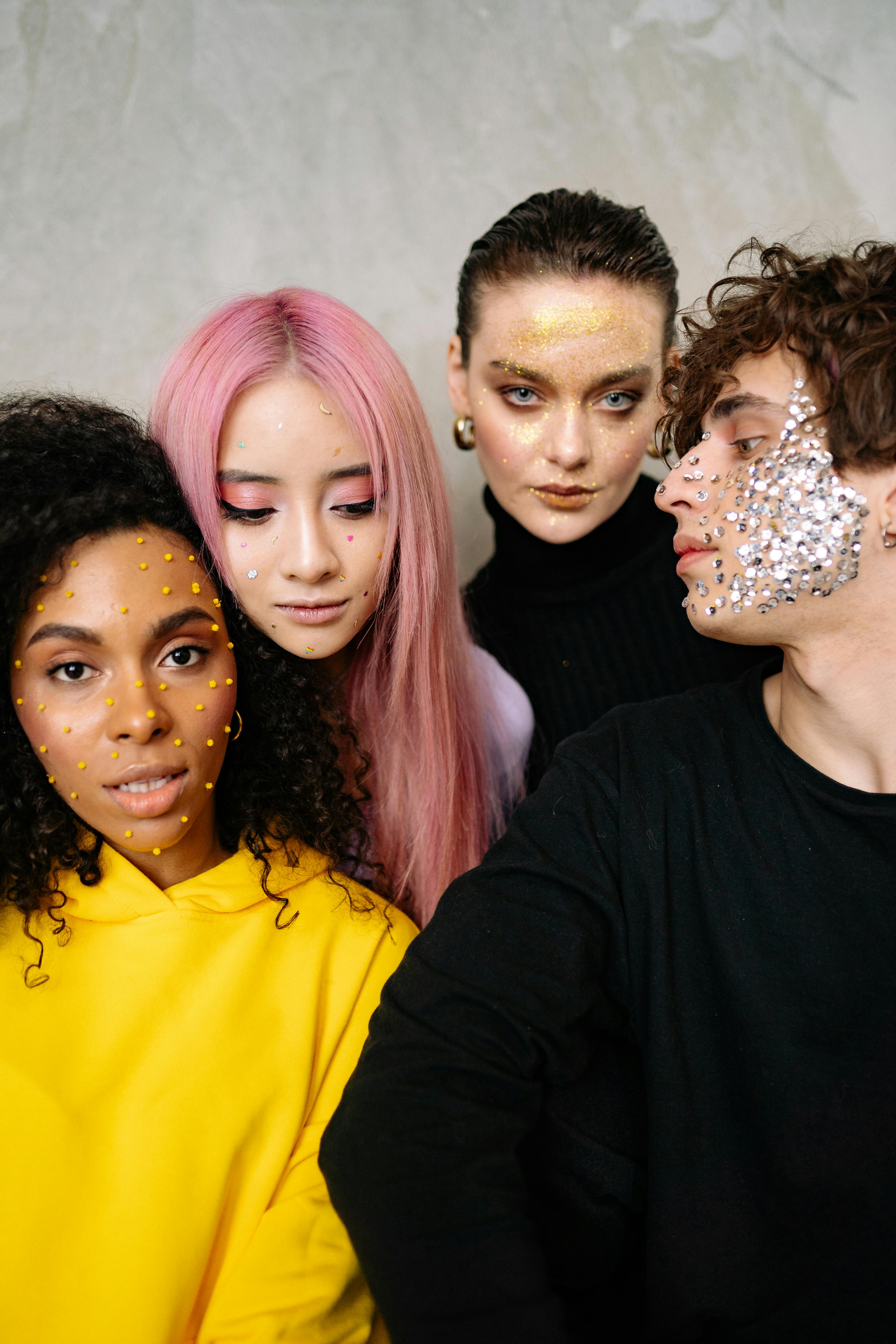 A Group of People with Glitter Make Up · Free Stock Photo