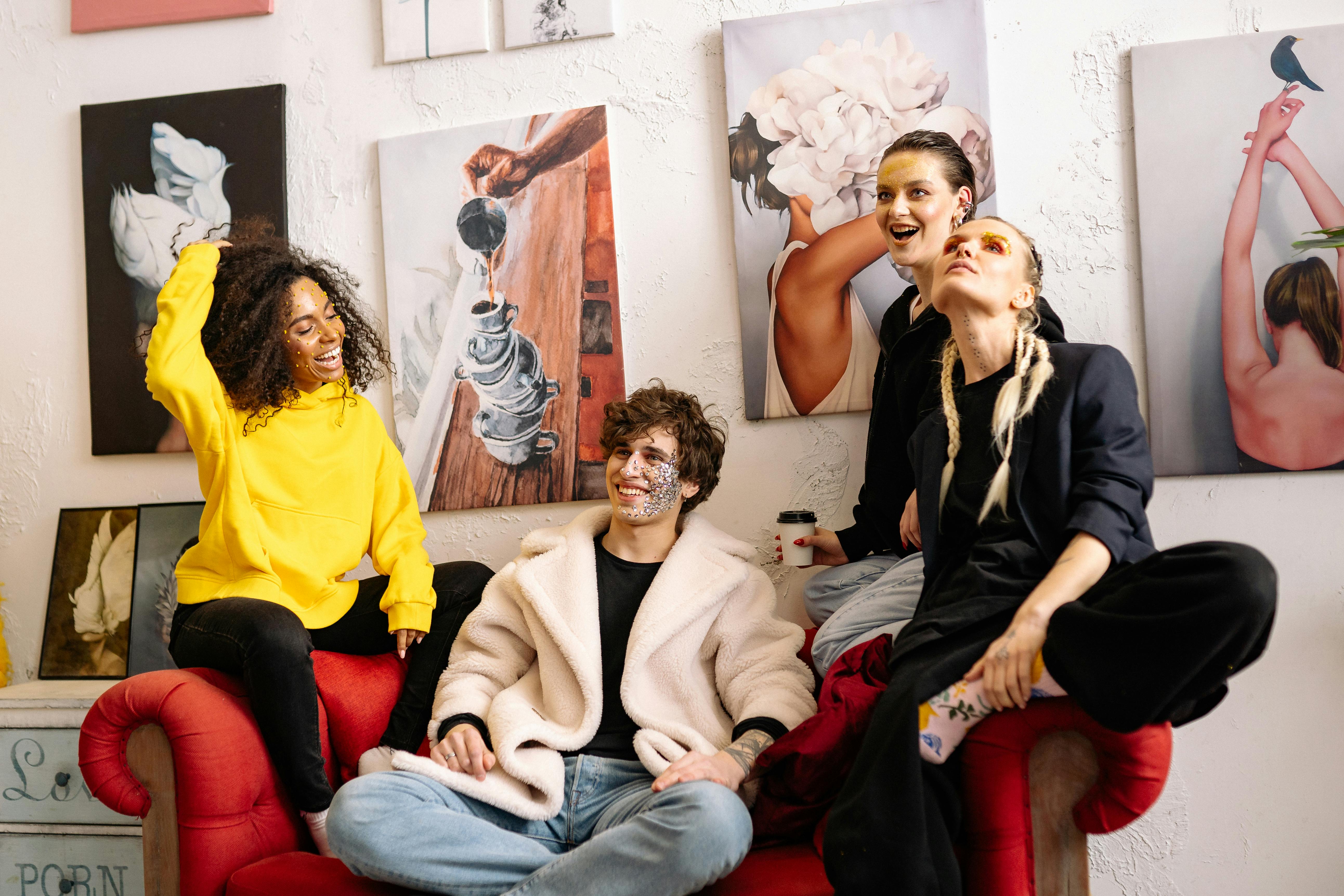 A Group of Friends Sitting in the Studio Couch · Free Stock Photo