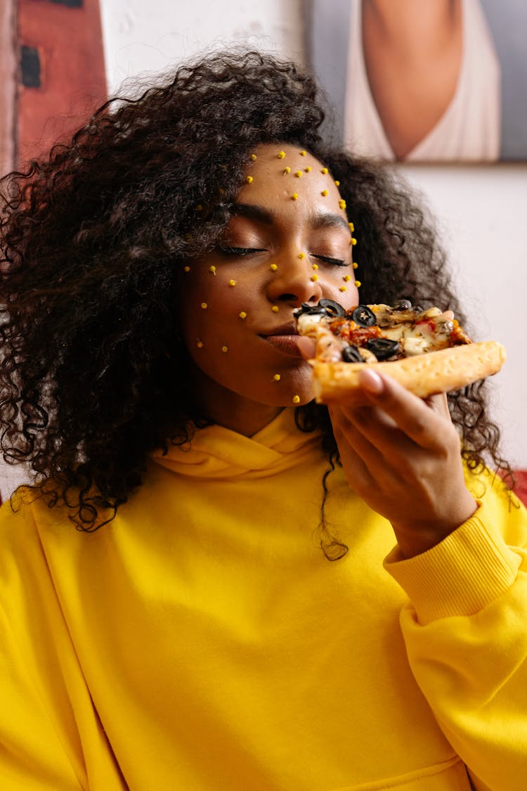 Woman With Indie Makeup Eating Pizza 