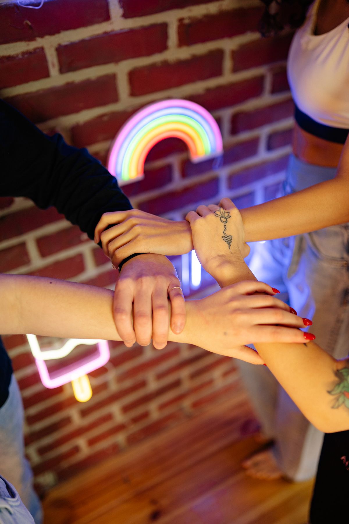 Diverse group of hands coming together in support and unity