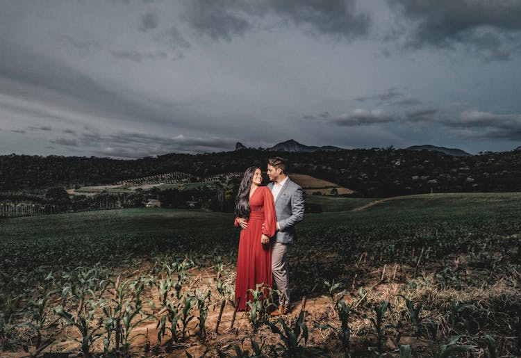 Happy Indian Couple In Farm Field