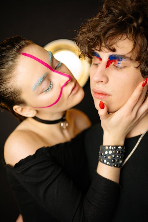 A Couple Wearing Art Makeups