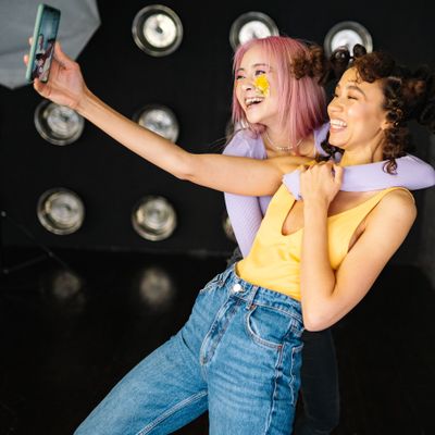 Two friends laughing during a selfie — photo by Yan Krukau on Pexels