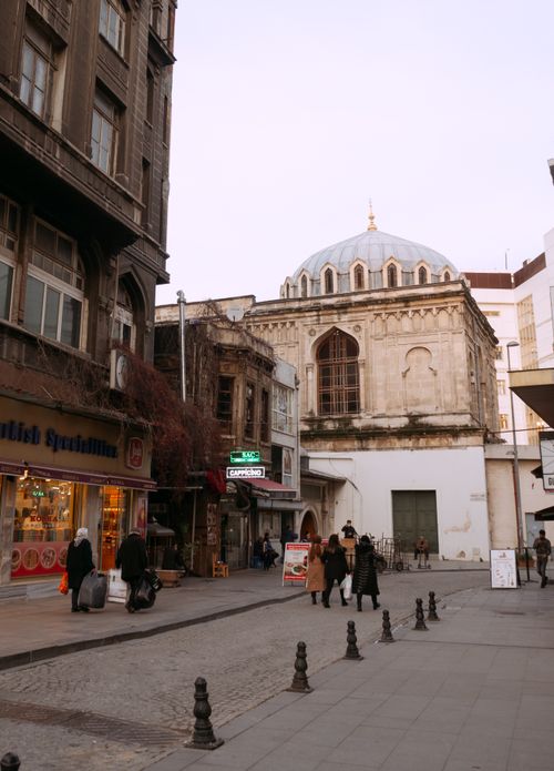 Free Street view in Istanbul featuring historical buildings and lively pedestrian scene. Stock Photo