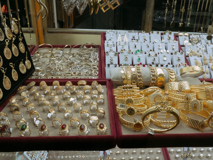 Gold and silver jewelry in a market display case