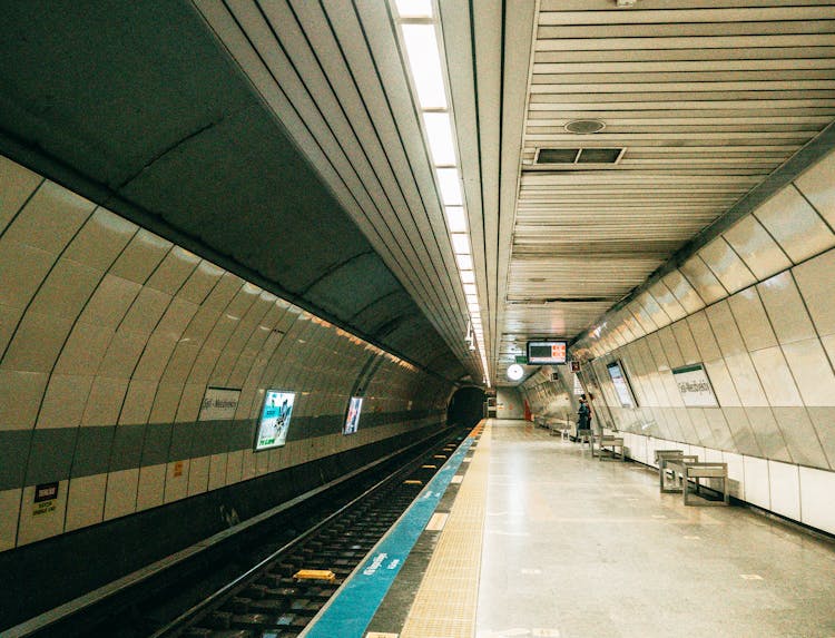 Symmetrical View Of An Underground Platform 