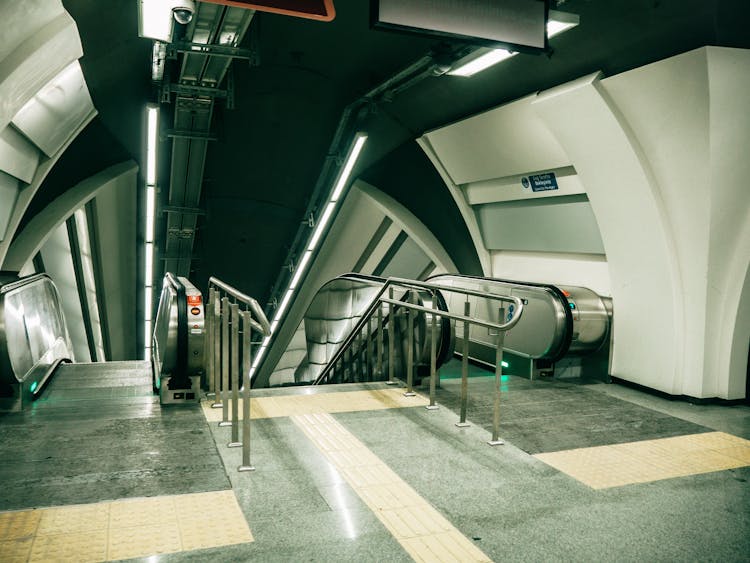 Empty Escalators Inside A Public Subway System