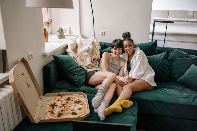 Couple Sitting On The Couch