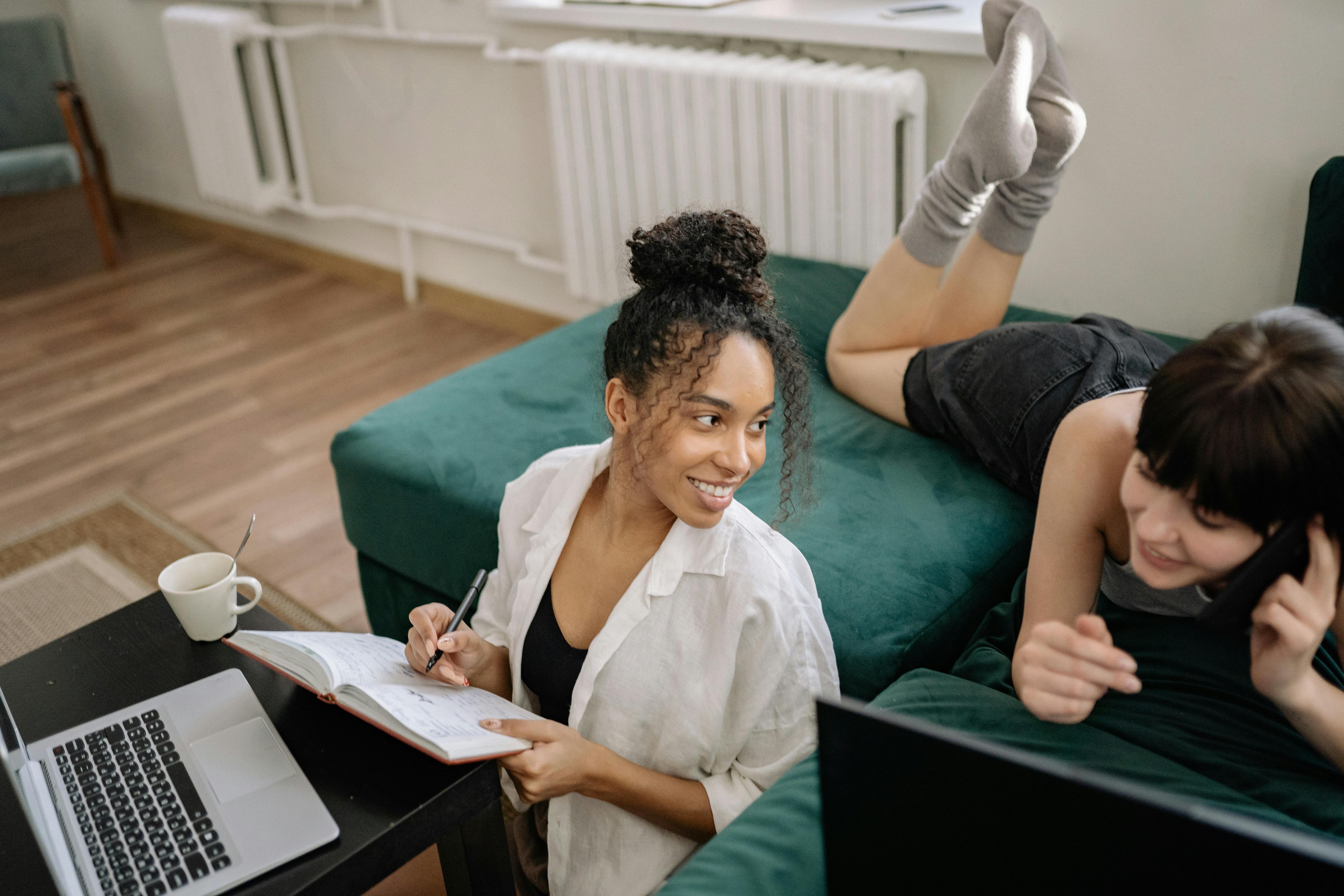 A young couple enjoying time together indoors, sharing love and laughter.