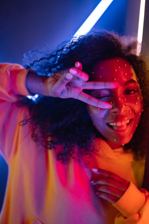 Portrait of a Girl Doing a Peace Sign