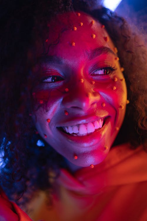 A Woman Smiling at the Camera