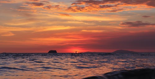 Gratis lagerfoto af dramatisk himmel, gylden time, hav