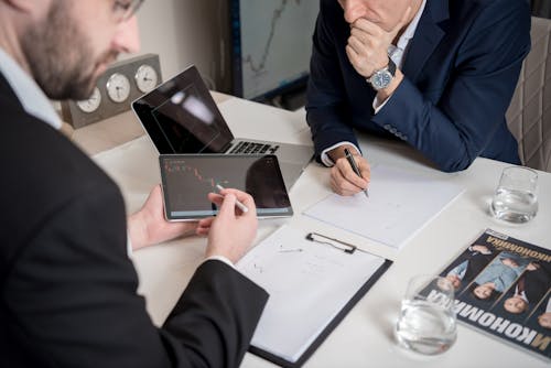 A Man Holding a Digital Tablet