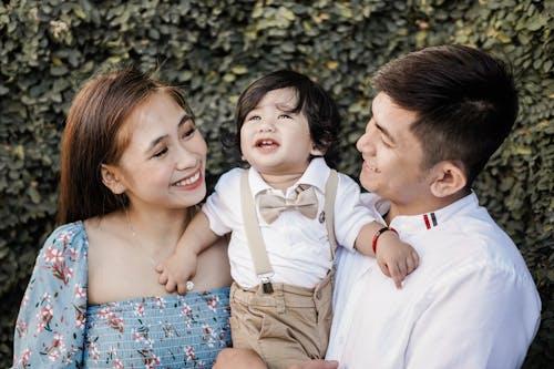 A Family Smiling at the Camera