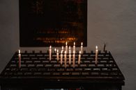 Lighted Candles In A Church