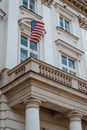 A Flag Waving On Balcony of A Building