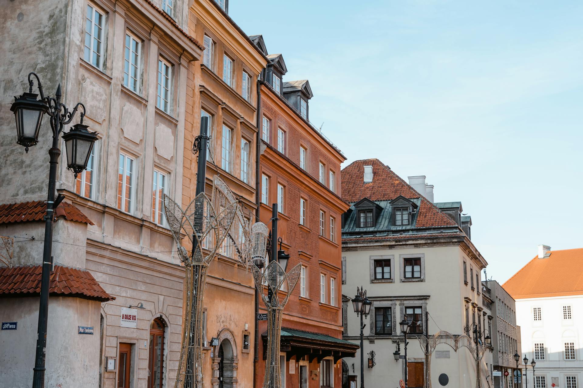 View of historic buildings with architectural details in a European old town.