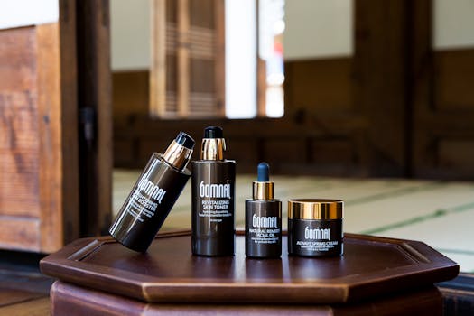 Skincare products elegantly displayed on a wooden surface with a serene indoor background.