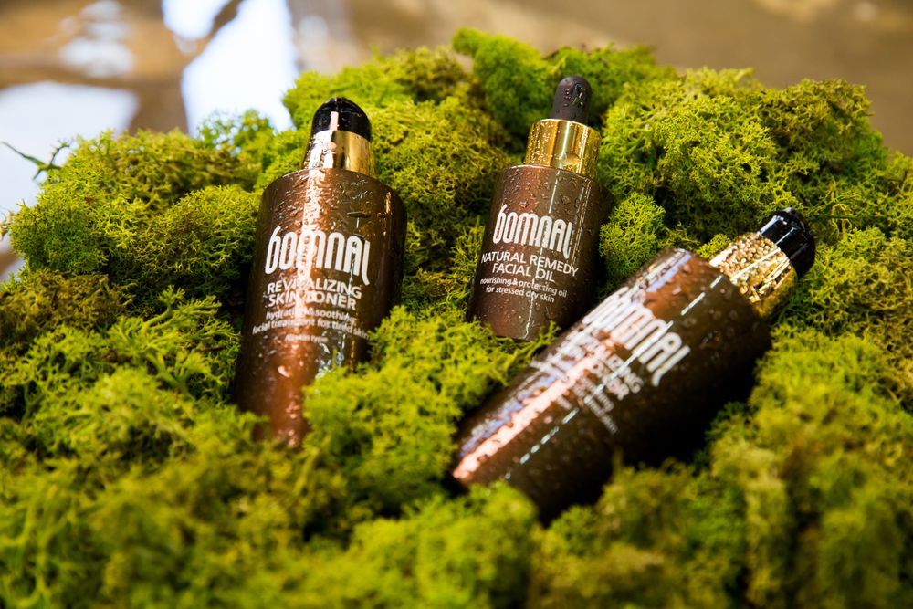 Natural cosmetic bottles and botanicals