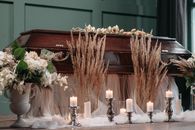 Flowers Near the Wooden Coffin