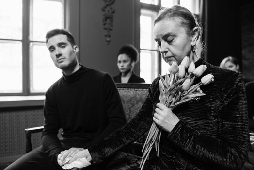 Man And Woman Sitting on the Chair