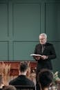 A Man Holding a Bible