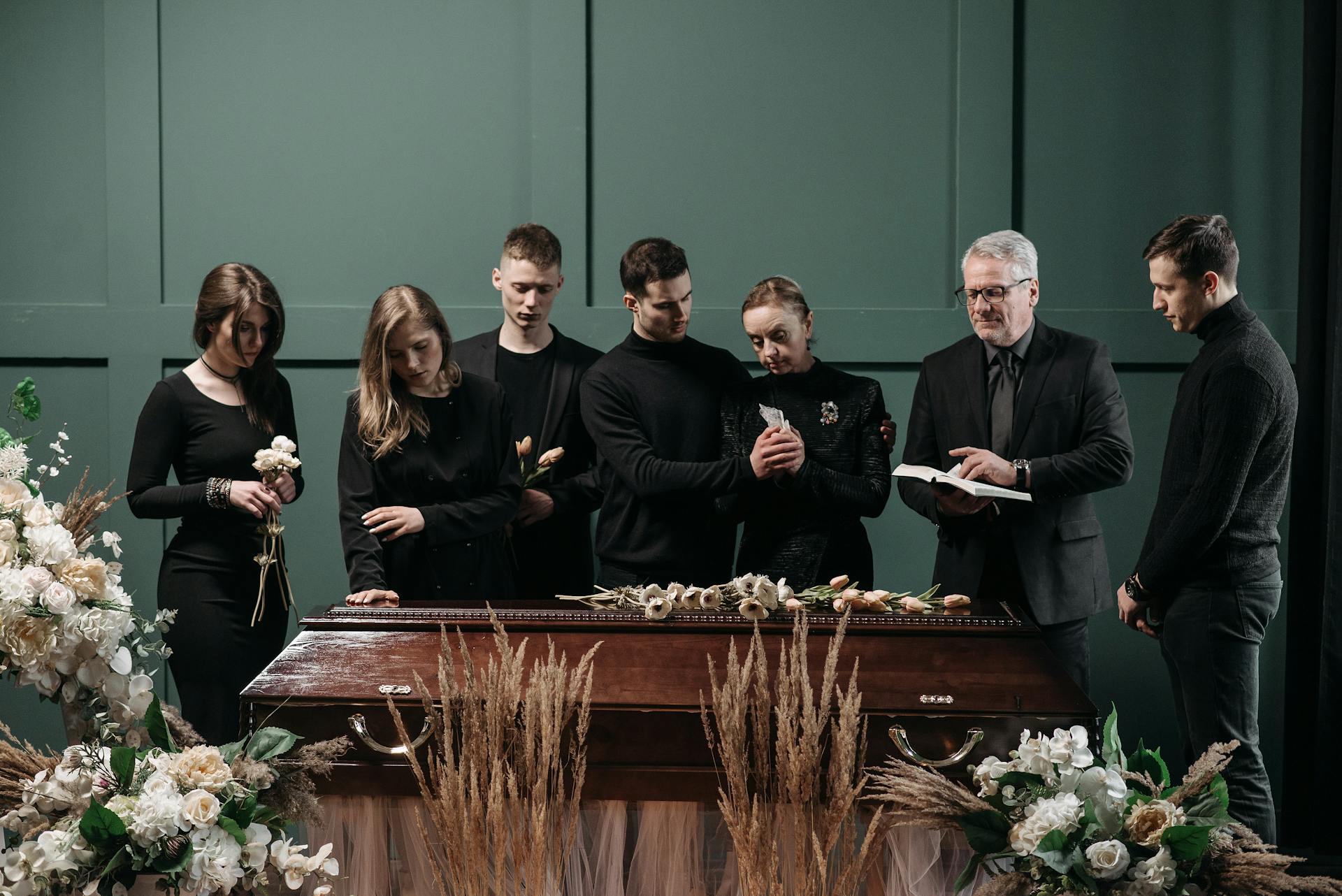 A Family and a Pastor in a Funeral Service