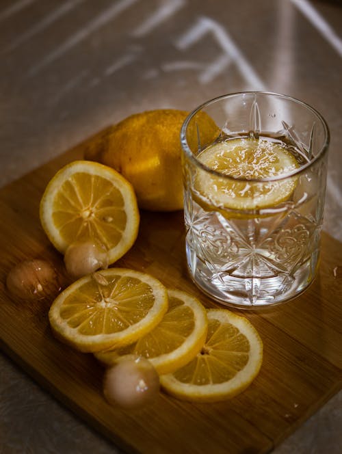 Slices of Lemon Beside the Drinking Glass