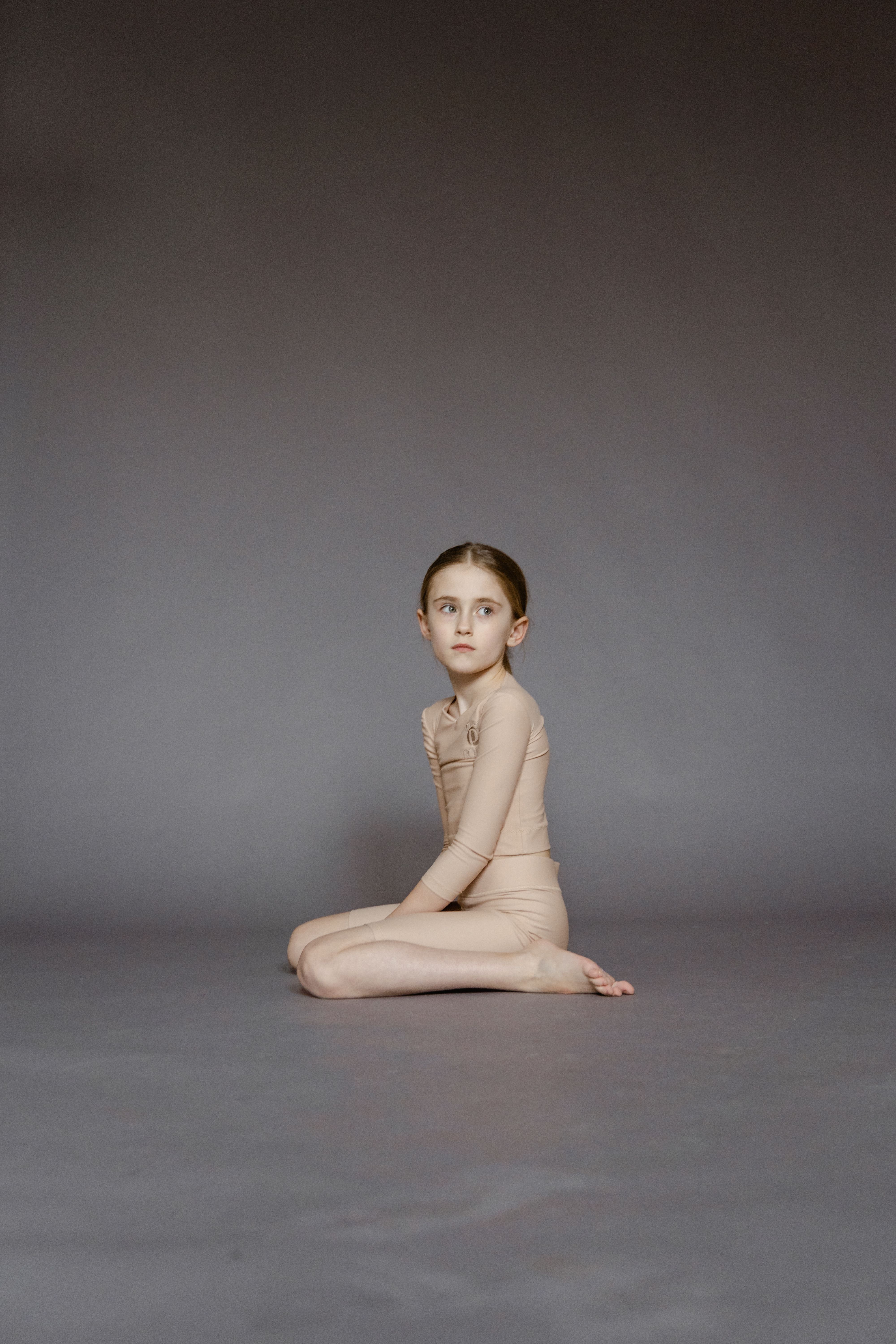 A Girl Sitting on the Floor · Free Stock Photo
