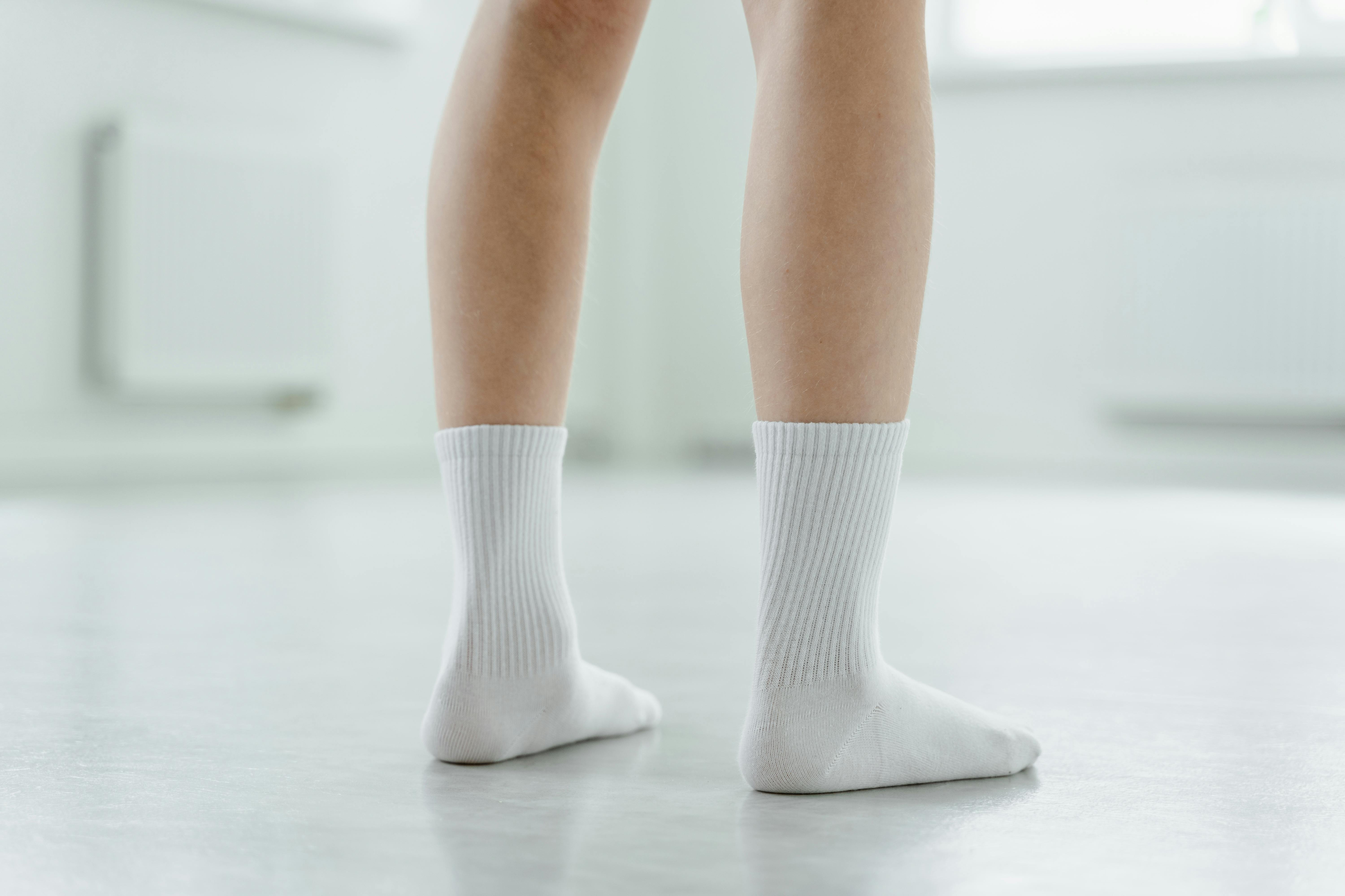 Browse Free HD Images of Feet Pose White Sport Sock