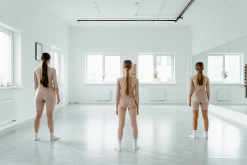 Three Girls Standing on the Floor