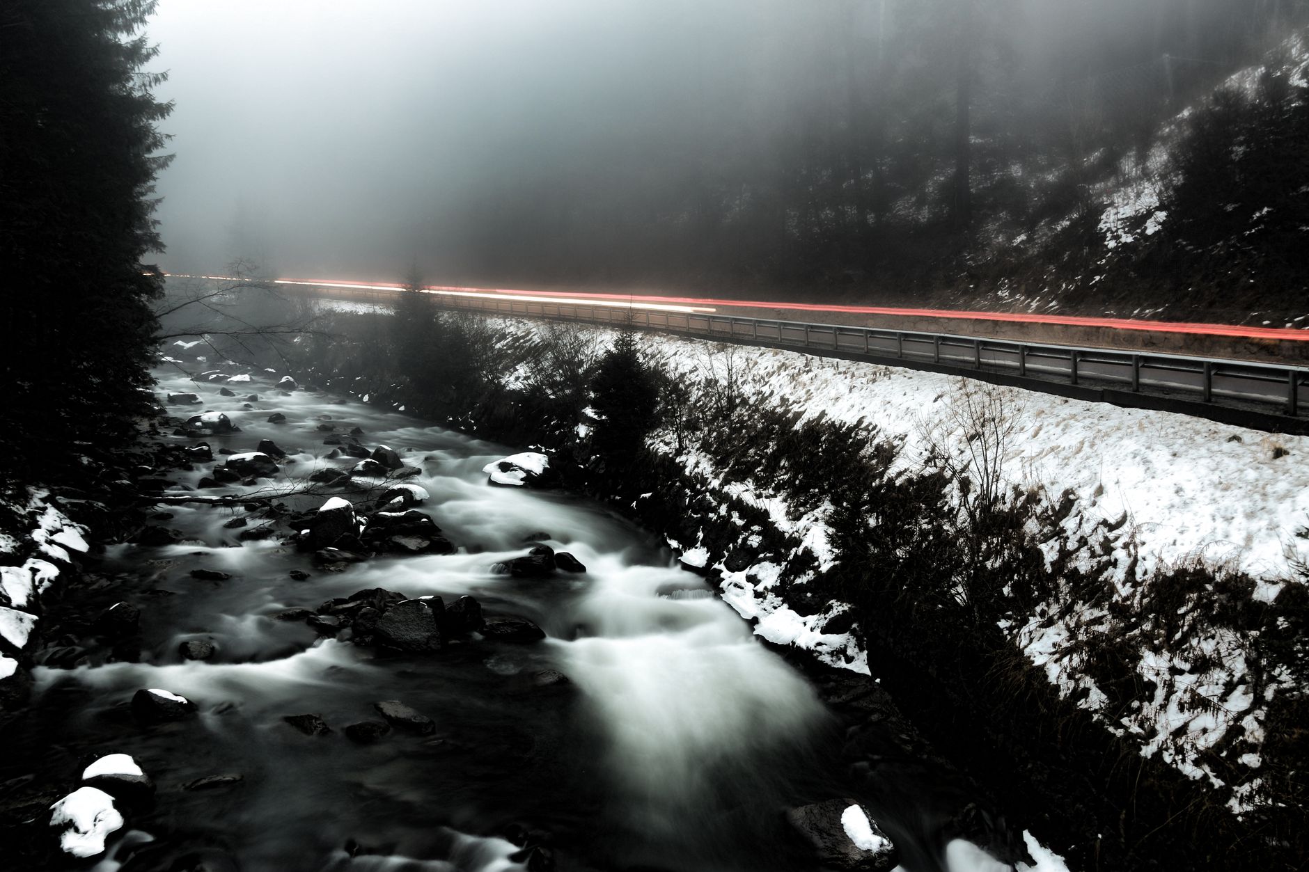 Snow-covered landscape featuring a misty creek and road with long exposure lights.. pexels, snow, covered