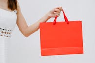 A Person Carrying a Paper Bag