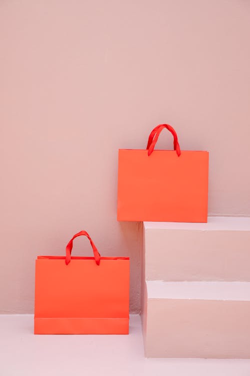Základová fotografie zdarma na téma detail, nákupní tašky, oranžová