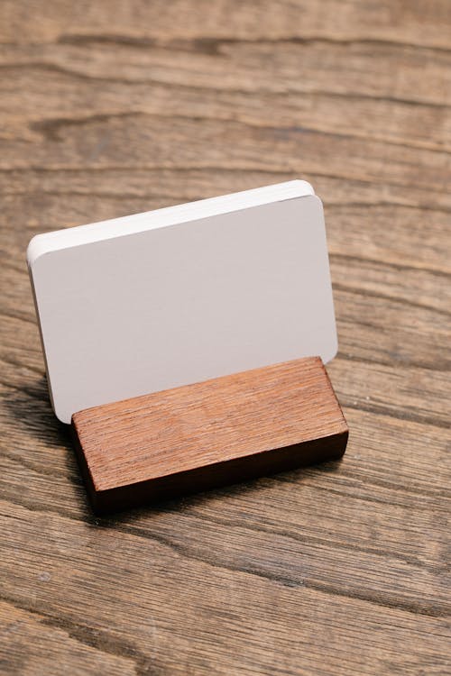 Blank White Plate and a Piece of Wood 