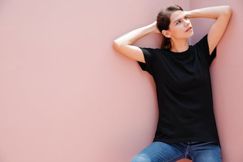 Dreamy model in casual clothes on sunny day