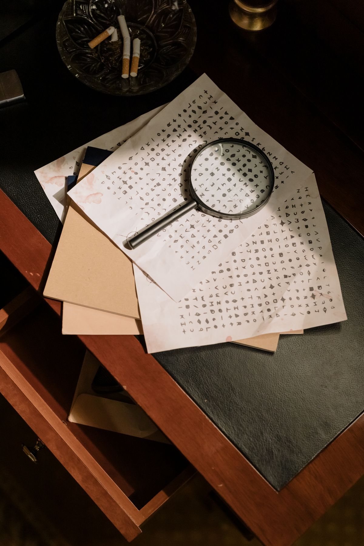 Documents and magnifying glass on a desk