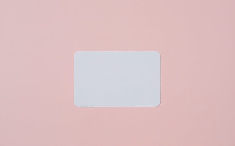 Blank Visiting Card On Pink Background