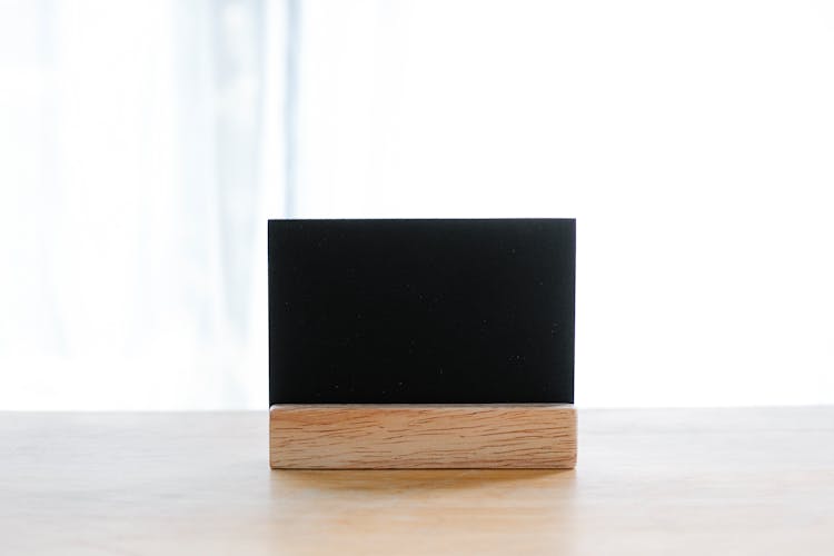 Black Name Card On Office Table