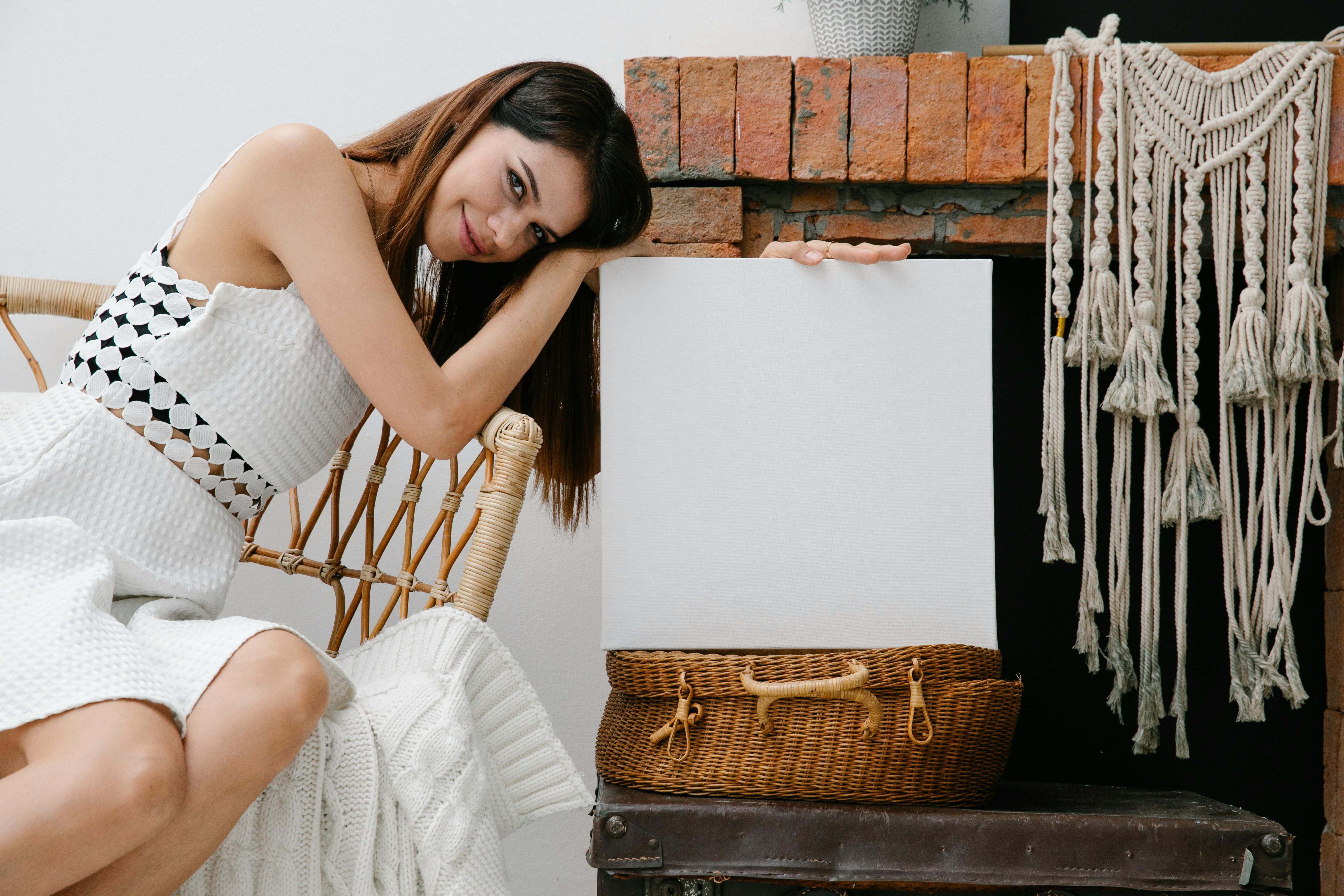 Silhouette of a woman looking out the window in a contemplative mood