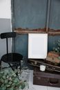 Empty frame placed on old fashioned suitcases