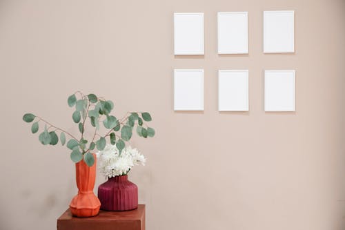 Free Empty photo frames hanging on wall Stock Photo