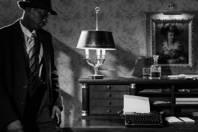 Moody black and white detective in a vintage office — cottonbro studio on Pexels