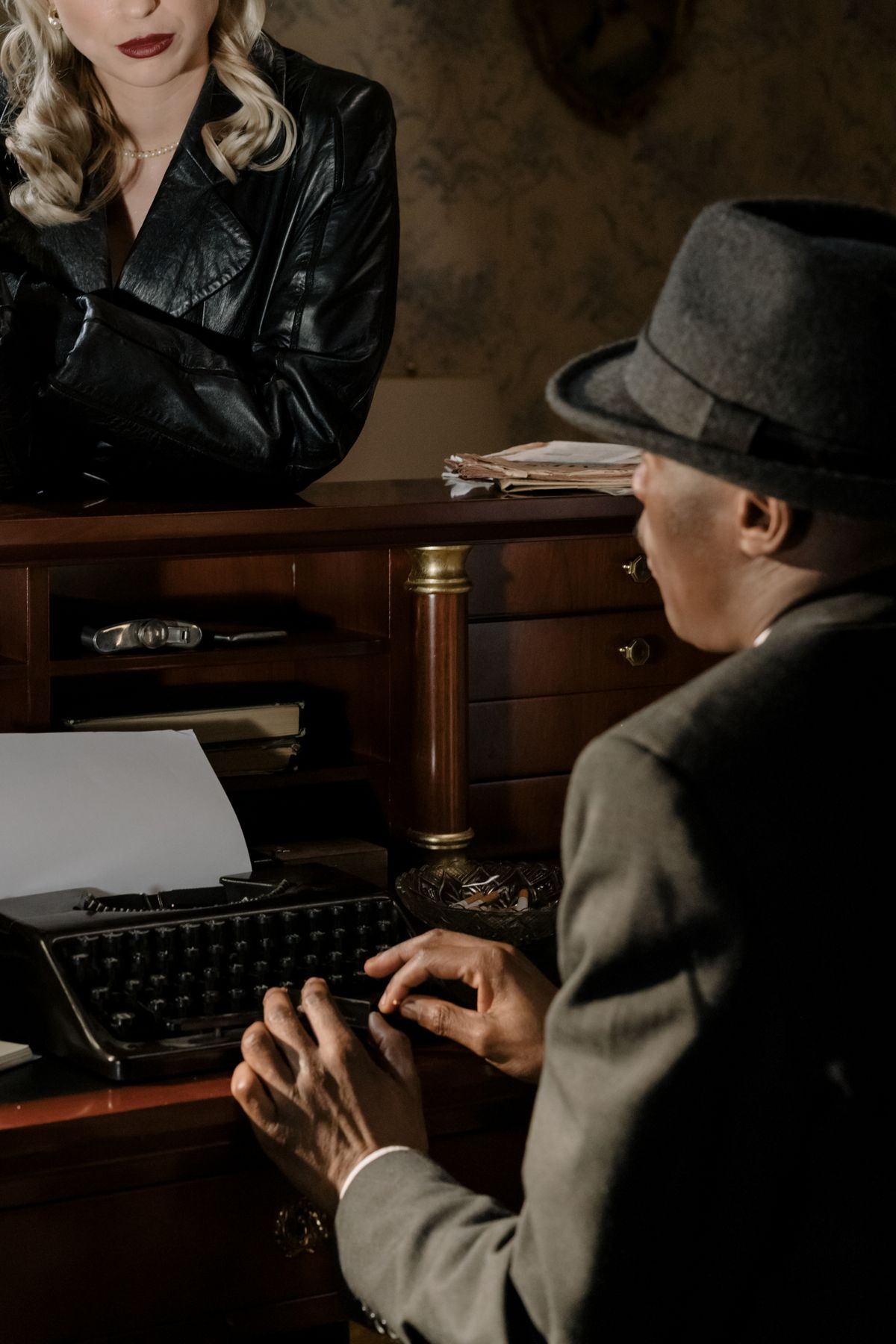 Investigator writing up case notes in the office