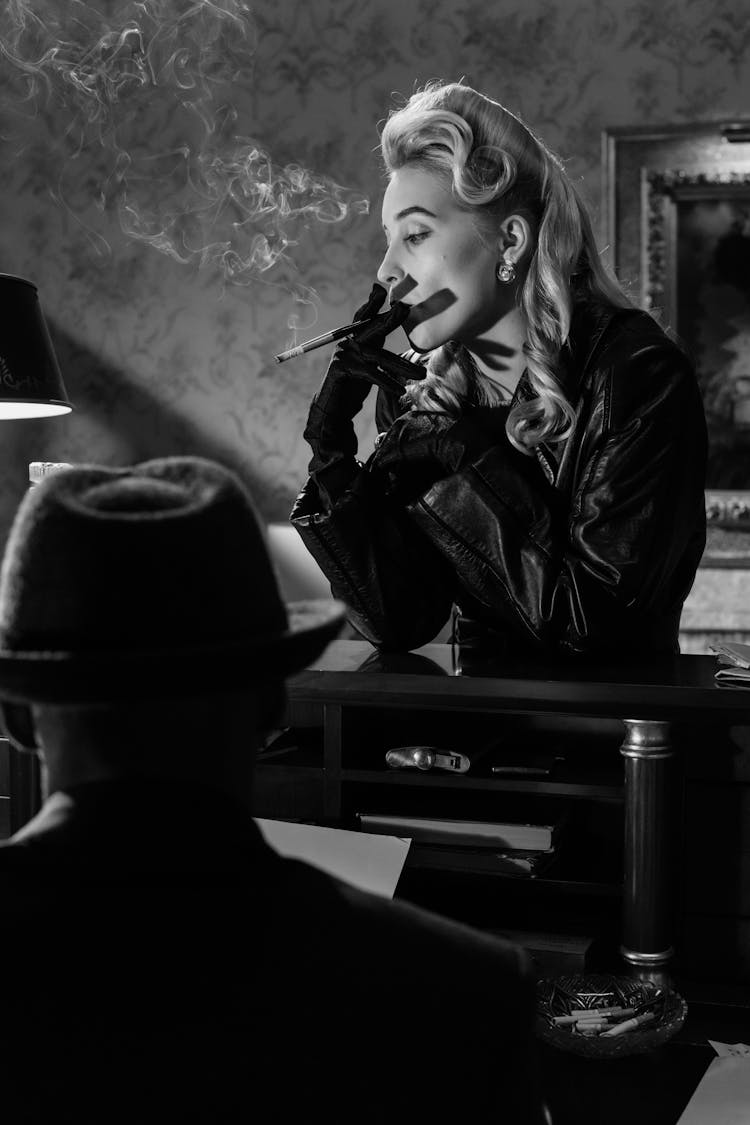 Photo Of Woman Smoking On Counter Top