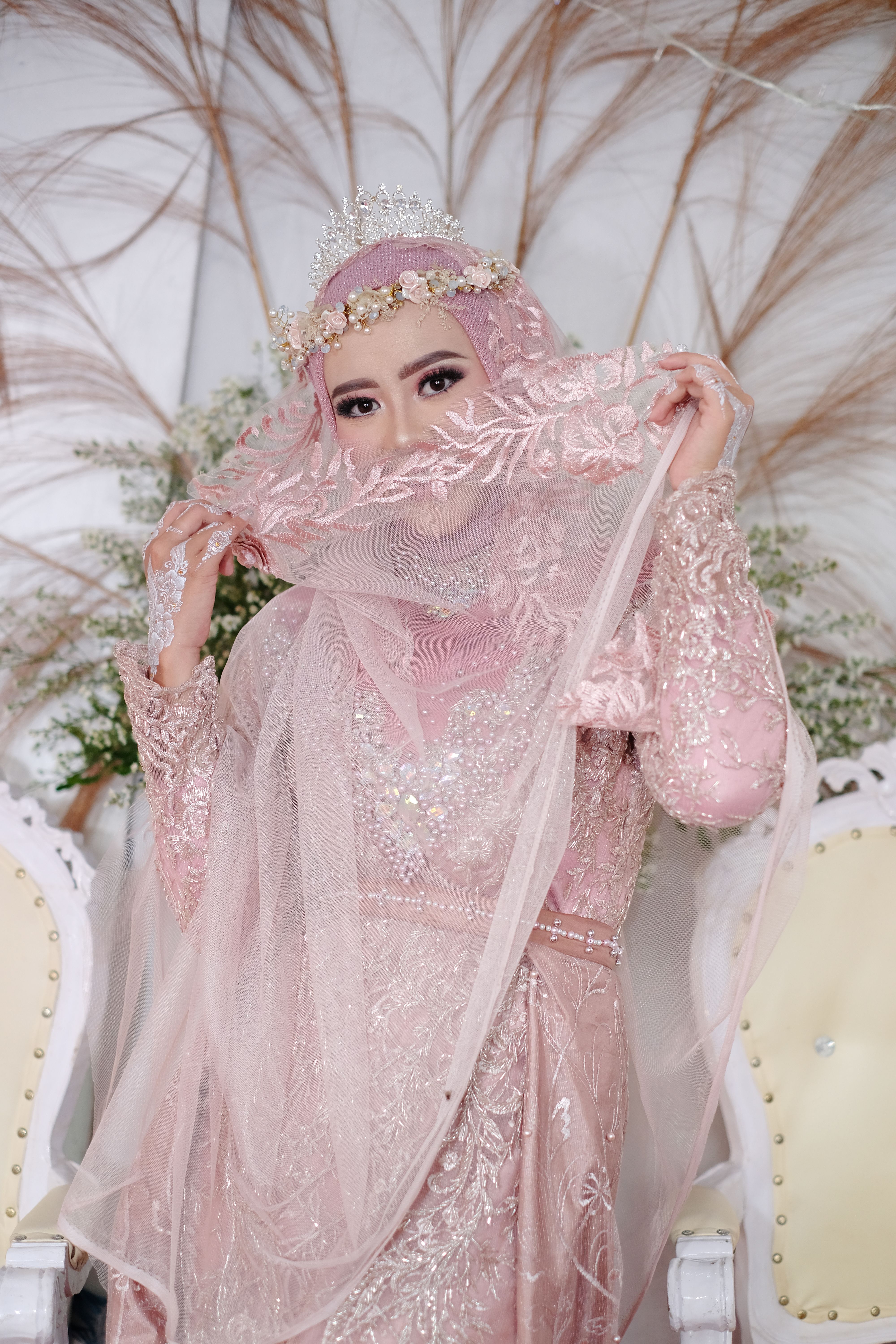 A Woman in an Elegant Pink Dress Wearing a Tiara · Free Stock Photo