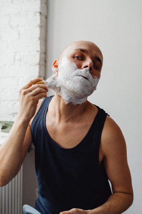 A Man Applying Shaving Cream